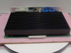 SynOptics LattisNet 3002 Power Supply rear view showing large black aluminum fin heatsink array and multi-pin edge connector for chassis installation