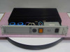 SynOptics LattisNet Model 3002 460W Power Supply front panel view showing orange power switch, IEC AC inlet, status indicator, and large finned heatsink