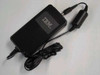 IBM 75H7522 AC Adapter top view showing IBM logo on black housing with barrel plug connector and attached AC cord