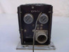 NARCO T-12MP-7 — rear panel view showing '12 Volts' label, two trimmer potentiometers (75504-1), and circular multi-pin connector with wire lead