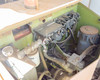 Clark OP15 forklift internal compartment with battery charger components, contactor panel, electric motor, and hydraulic components visible