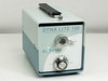 A.G. Heinze Dyna Lite 150 Fiber Optic Power Supply FO-150 — front-right view showing fiber output port, rotary intensity knob, and AGHeinze Precision MicroOptics logo