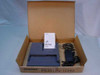 Toshiba PA3011U-1CHG battery charger open box with PA2450U AC adapter and manual – complete contents view