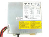 AST API-8069F power supply label showing model number, part number 230128-004, input/output voltage specs, and Made in Taiwan R.O.C. marking