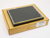 Toshiba P000272230 LTM13C417L 13.3" LCD module face-down on original cardboard box, protective film visible on screen surface