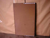 Herman Miller Action Office II work surface – underside view showing particleboard substrate and aluminum mounting bracket rail with mounting holes