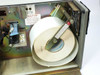 Intermec 8636AT interior view – label roll stock on spindle and internal fan visible with cover open