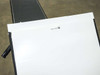SoloPower SP1-75 panel end detail showing white backing sheet and QC label (printed upside-down) with barcode