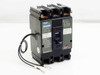 Fuji Electric BU-ESB3015 3-pole 15A 600V molded case circuit breaker — front panel view showing label, toggle, and attached lead wires