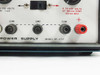 Heath SP-2717 front panel lower section close-up showing MODEL SP-2717 label, COM/GND/COM binding posts, red positive post, and output spec label 0-400V at 100mA cont 125mA max