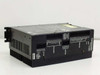 Parker Compumotor AXL-Drive Microstep Drive — three-quarter top/front view showing AC Power, Encoder, Motor, and Indexer terminal block sections with heat sink fins on left side