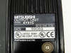 Mitsubishi AY51C MELSEC PLC Output Module – close-up of nameplate label showing Model AY51C, DC12/24V 0.3A rating, date code 9908G, and UL CE certifications