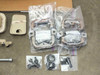 Lexus LX570 rear seat hardware — two large bagged seat cushion hinge brackets, small bolts bag, D-ring hardware, and additional hardware bags