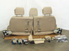 Lexus LX570 3rd row seat assembly — rear view showing full seat assembly with headrests upright, fold straps visible, with all components and hardware bags spread out