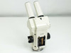 Zeiss Stemi SV 11 microscope head – rear view showing part number 45 50 56 stamped on body and missing back plate with internal mechanism exposed