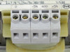 Moeller STI 0.06 primary terminal block close-up — five screw terminals labeled 0, -5%, 400, +5% for input voltage adjustment