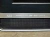 Sony KDL-V40XBR1 front lower bezel close-up — XBR logo with HDMI, Dolby Digital, DTS, SRS, and S-Master Digital Amplifier badges