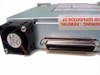 Streamlogic SM9100-01-4 SCSI Drive Chassis – close-up of rear panel showing Foxconn cooling fan and 68-pin SCSI port with warranty seal label