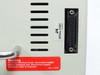 Perkin-Elmer Cetus DNA Thermal Cycler — rear side panel close-up showing J4 DB-25 serial port and electrical shock warning label (part no. 0211-3095)