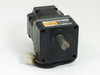 Oriental Motor VEXTA FBLM5120C-GF brushless DC motor — rear three-quarter view showing output shaft and multi-pin connector leads