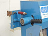 CRL 2200RP roller platen close-up showing tension adjustment knob, red spring tensioner, bearing roller, and black lever handle