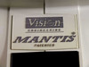 Close-up of Vision Engineering MANTIS PATENTED embossed nameplate badge on microscope housing