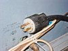 30A 250V twist-lock power plug on input power cable with Warning label noting water must be circulated prior to operation