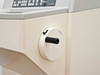 Microm HM500 OM left side panel showing large manual hand-wheel for coarse specimen advance
