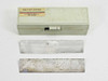Dorn & Hart Microedge blade case (Villa Park, Illinois) with two 185mm C-profile microtome blades showing use wear
