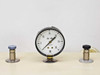Napco 5831 Vacuum Oven – close-up of top-mounted vacuum gauge (0–30 in Hg) flanked by two needle valve fittings with blue and black caps on stainless bases