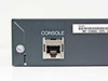 Rear left showing RJ-45 console port and partial PID VID label reading WS-C2960G-24TC-L