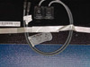 Uni-Solar PVL-68 solar panel rear view showing MC3 cable routing, output connectors, and product labels