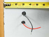 Uni-Solar PVL-128 output wire length shown against tape measure, approximately 4 inches for positive and negative leads