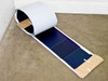 Single Uni-Solar ePVL-144T flexible amorphous solar panel partially unrolled showing thin-film cell surface and white backing