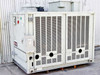 Trane CGAF-C20 20-ton air-cooled chiller — front and right-side view showing louvered condenser panels, fan stack on top, and Trane logo on lower left corner