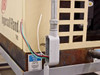Ingersoll Rand TMS 0140 electrical power inlet area with exposed wiring leads and Ingersoll Rand TMS branding on cream cabinet