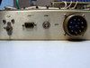 TRW F767155-1 rear panel left side showing circuit breaker CB1, DB9 connector J104, coaxial connector J105, and large mil-spec circular connector J101