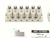 SMC 6-station pneumatic manifold bank with solenoid valves mounted on top, KJS03-32 fittings bag nearby