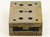 Schneeberger linear slide top-down view showing grid pattern of approximately twelve tapped mounting holes across the steel upper platform surface