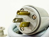 Balzers Pfeiffer DUO 016B power cord plug closeup — Arrow-Hart brand, 6A 125V US NEMA plug with brass blades