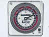 Bright Instrument defrost clock close-up showing 24-hour programmable analog timer dial with Bright logo