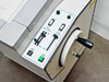 Bright OTF microtome drive control panel on left side showing Start Drive and Stop Drive buttons, Zone and Speed Control sliders, trim and drive toggle switches, and handwheel