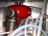 FSI 2134N internal view showing red Halon fire suppression canister integrated within the chemical plumbing system