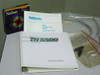 Tracor Northern TN-6500 included accessories — Operator's Manual binder, Tektronix P660I Temperature Probe Instruction Manual, Nashua 5.25-inch floppy diskettes, fiber optic cable, and misc hardware