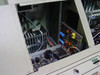Telos Labs 650 System interior view with access panel open showing electronics chassis, power supply, and wiring harness