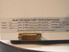 EG&G 1235 spectrograph grating label — shows Grating 1: 150 g/mm @ Blaze 500 nm ruled, Grating 2: 300 g/mm @ Blaze 500 nm ruled, Grating 3: 1200 g/mm @ Blaze 500 nm ruled, slit width 25-75 microns, GPIB Address 11, serial 226737