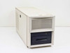 Sun Microsystems 3701415-02 external tape drive enclosure – front-left three-quarter view showing cream beige case with ventilation louvers and dark blue Exabyte 8mm tape drive bay