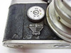 Top-down close-up of Argus C-Four showing shutter speed dial (B, 10, 25, 50, 100, 300) and embossed Argus logo on leatherette top plate
