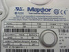 Maxtor 90650U2 label detail showing model, HDA/PCBA revisions, cylinders/heads/sectors, jumper settings, and 12V 5V power specs