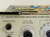 HP 8552B Spectrum Analyzer IF Section — close-up of front panel HP logo, model label, Manual Scan knob, Base Line Clipper, and Scan Time Per Division dial